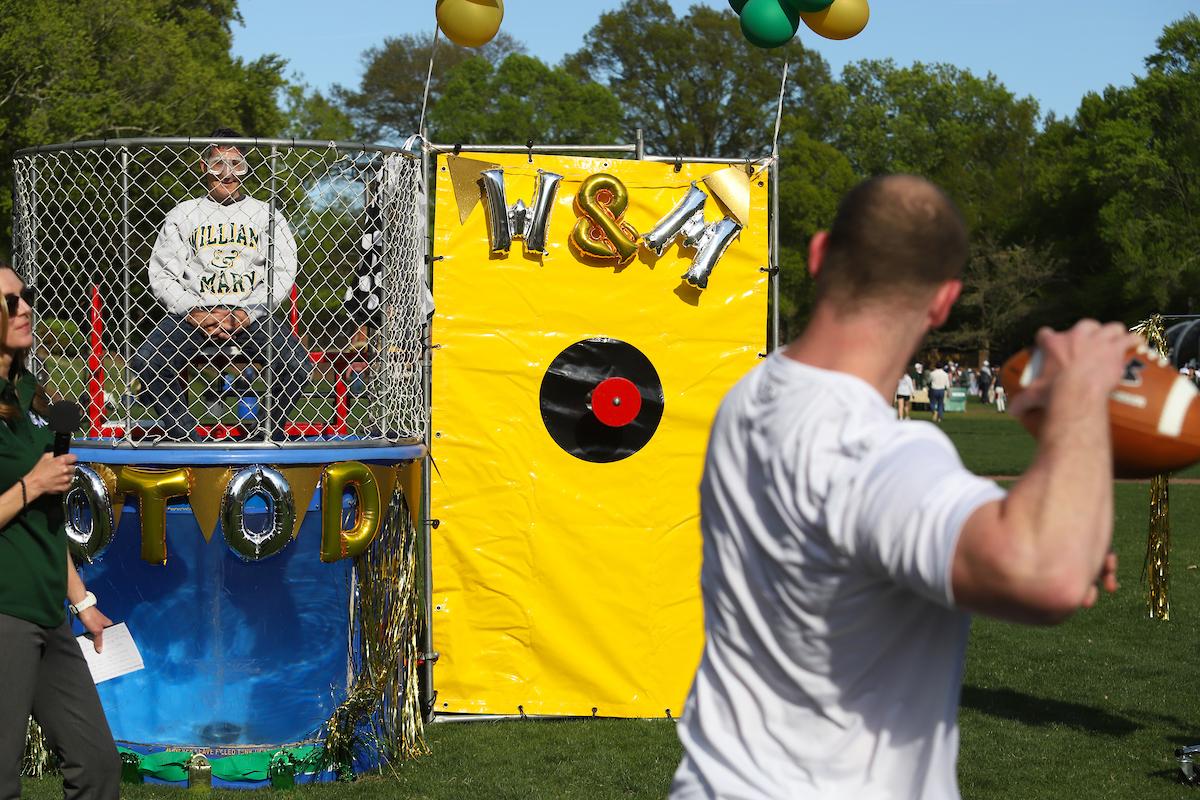 A captain of the football team gets ready to dunk Dan Cristol.