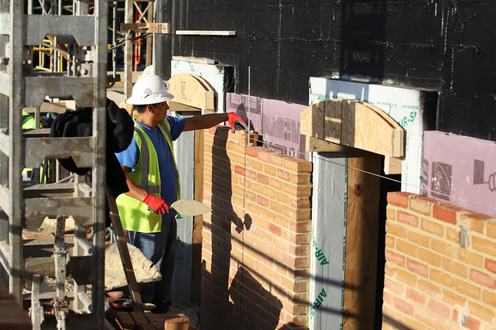 Throughout November, each brick was carefully added to the exterior of the building. The brick color was purposefully chosen to match the historic Bright House.